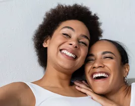 women smiling and happy